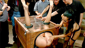 Public fucking of the slave in a box